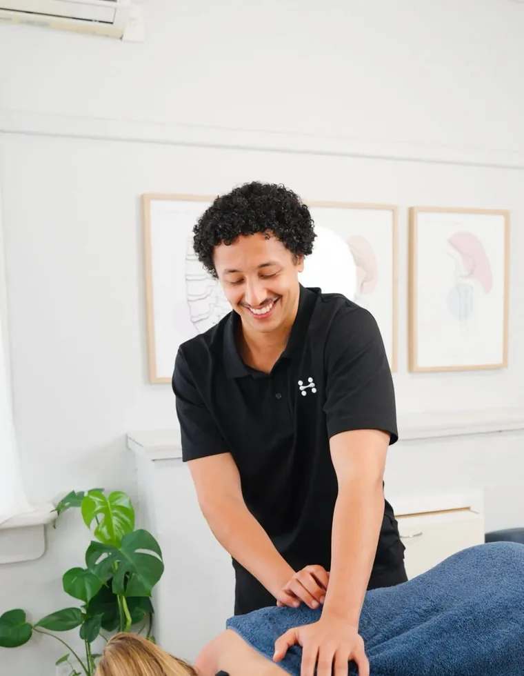 An osteopath treating a patient at Heidelberg Osteopaths